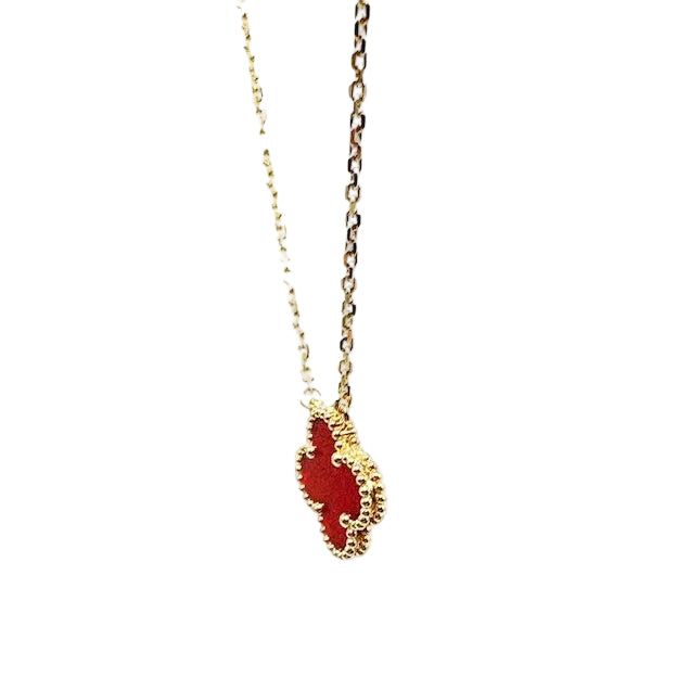 VAN CLEEF & ARPELS "Vintage Alhambra" Pendant Necklace in yellow gold and carnelian