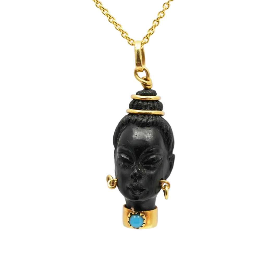 Yellow gold, ebony, and turquoise pendant