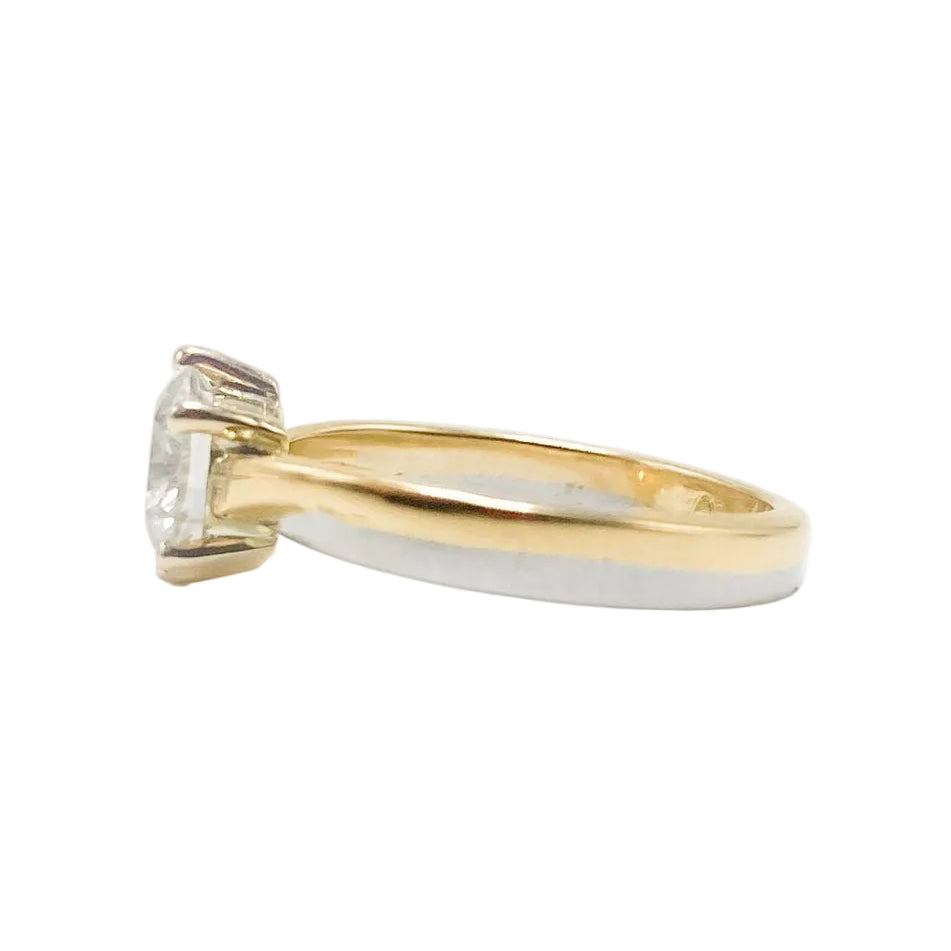 Solitaire Ring in White gold, Yellow gold, and Diamond