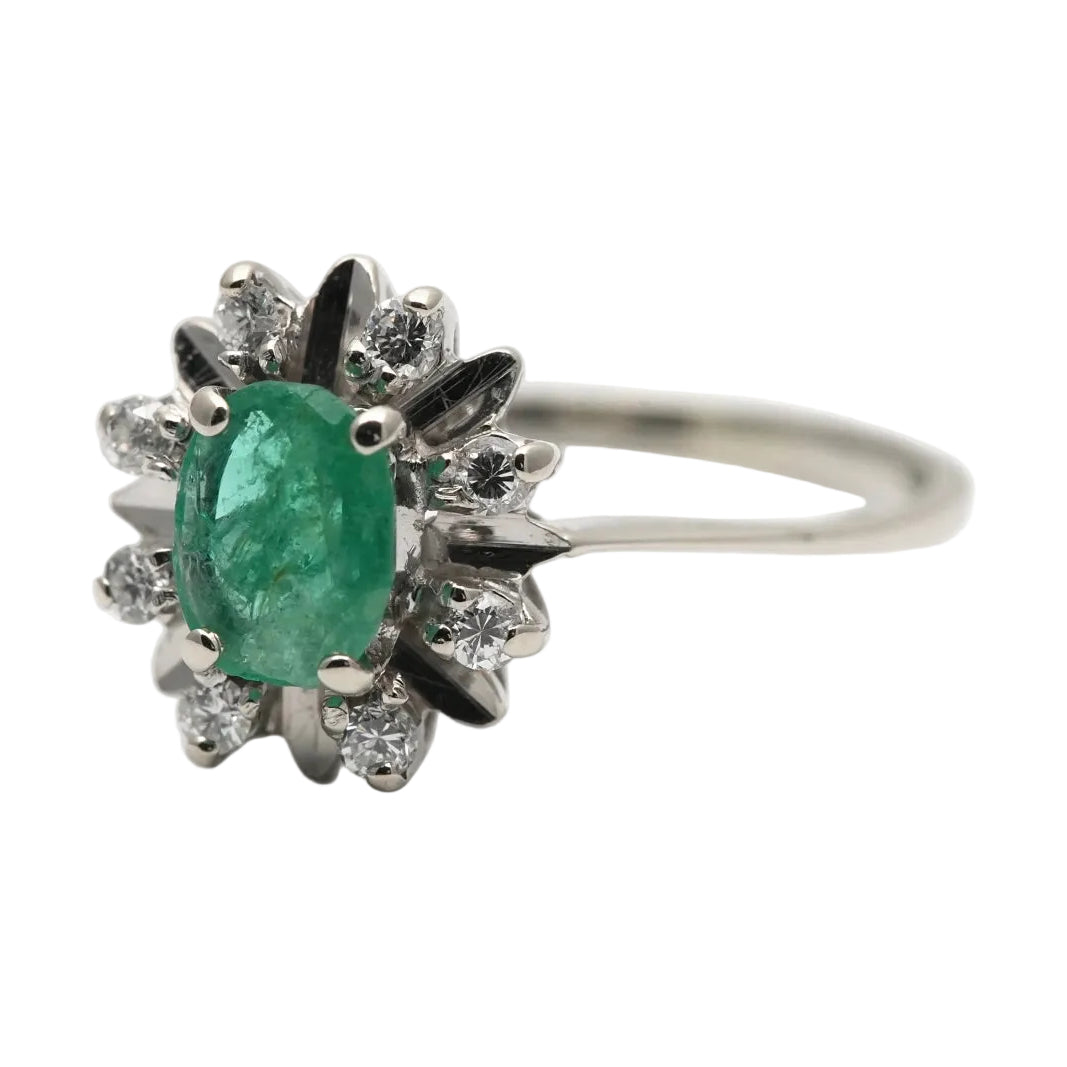 "Entourage" Ring in White Gold, Emerald, and Diamonds