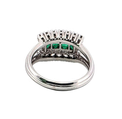 White gold ring with emeralds and diamonds