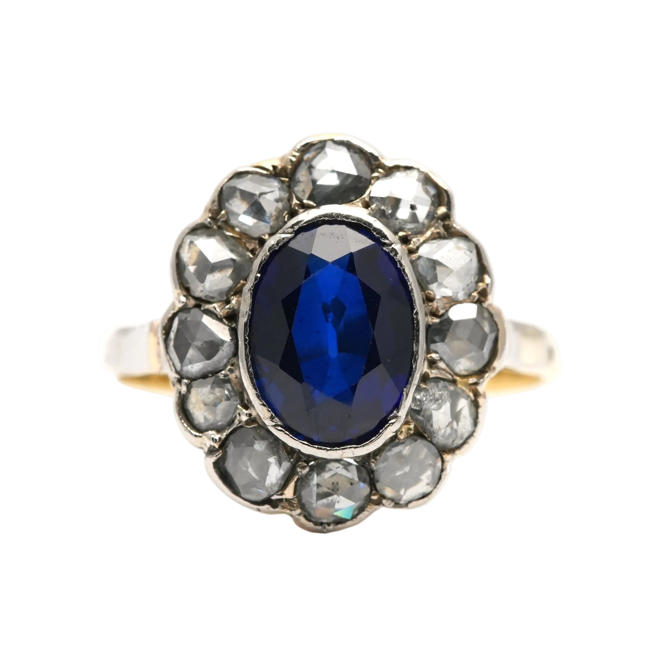 Entourage Ring in white gold, yellow gold, sapphire, and diamonds