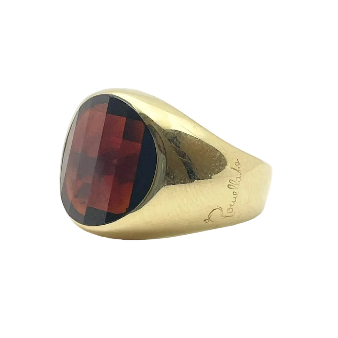 Bague Chevalière POMELLATO en or jaune et grenat