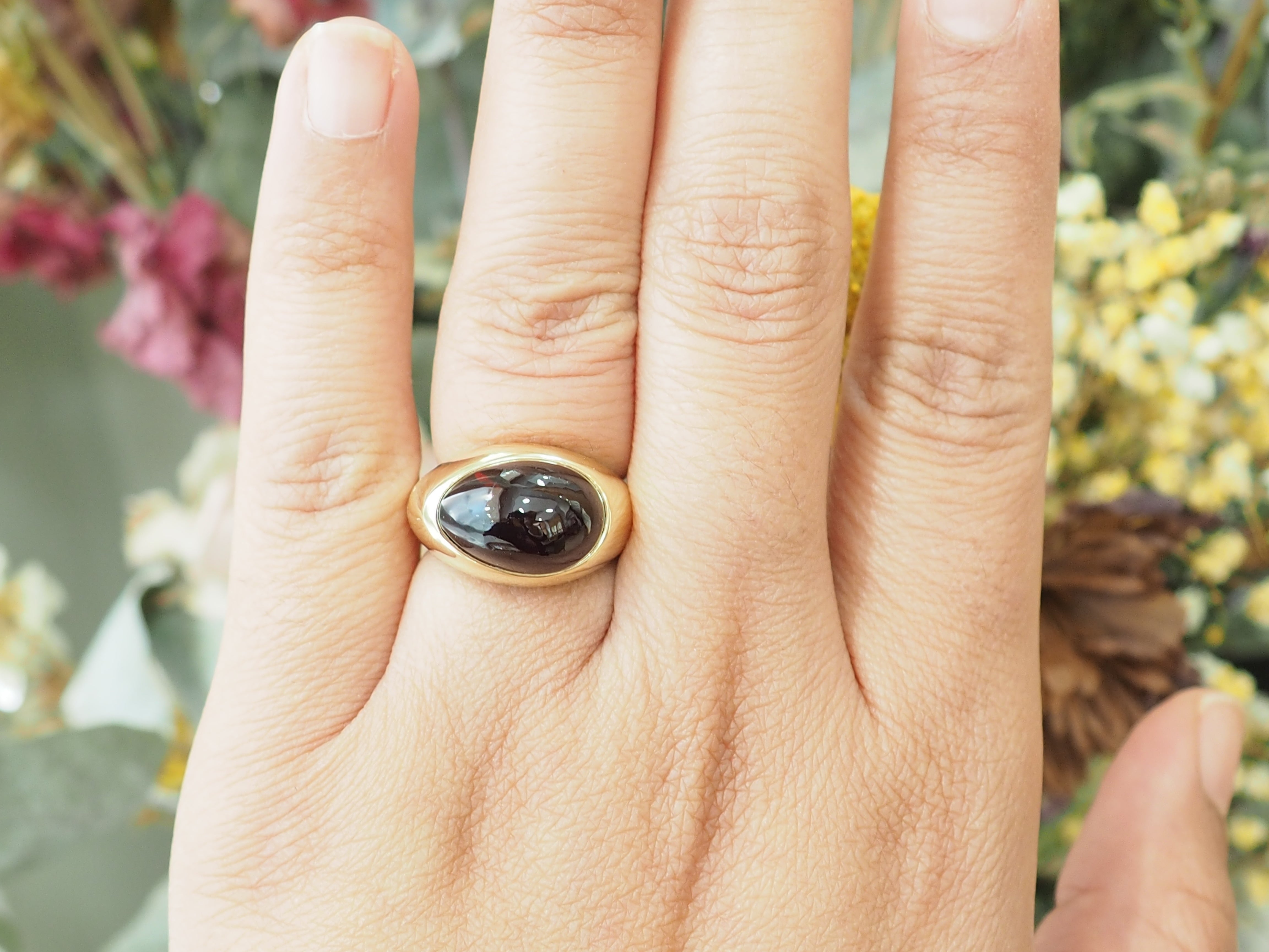 Bague POMELLATO en or jaune et grenat