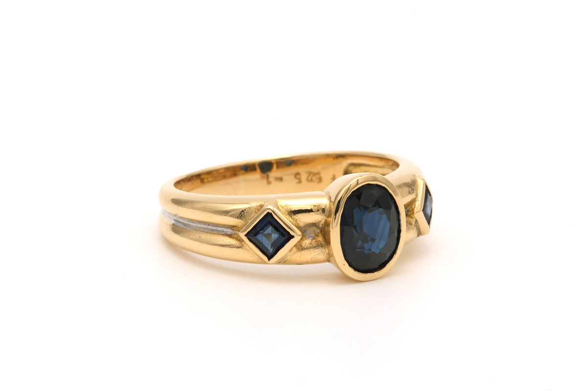 Trilogy Ring in white gold, yellow gold, and sapphires