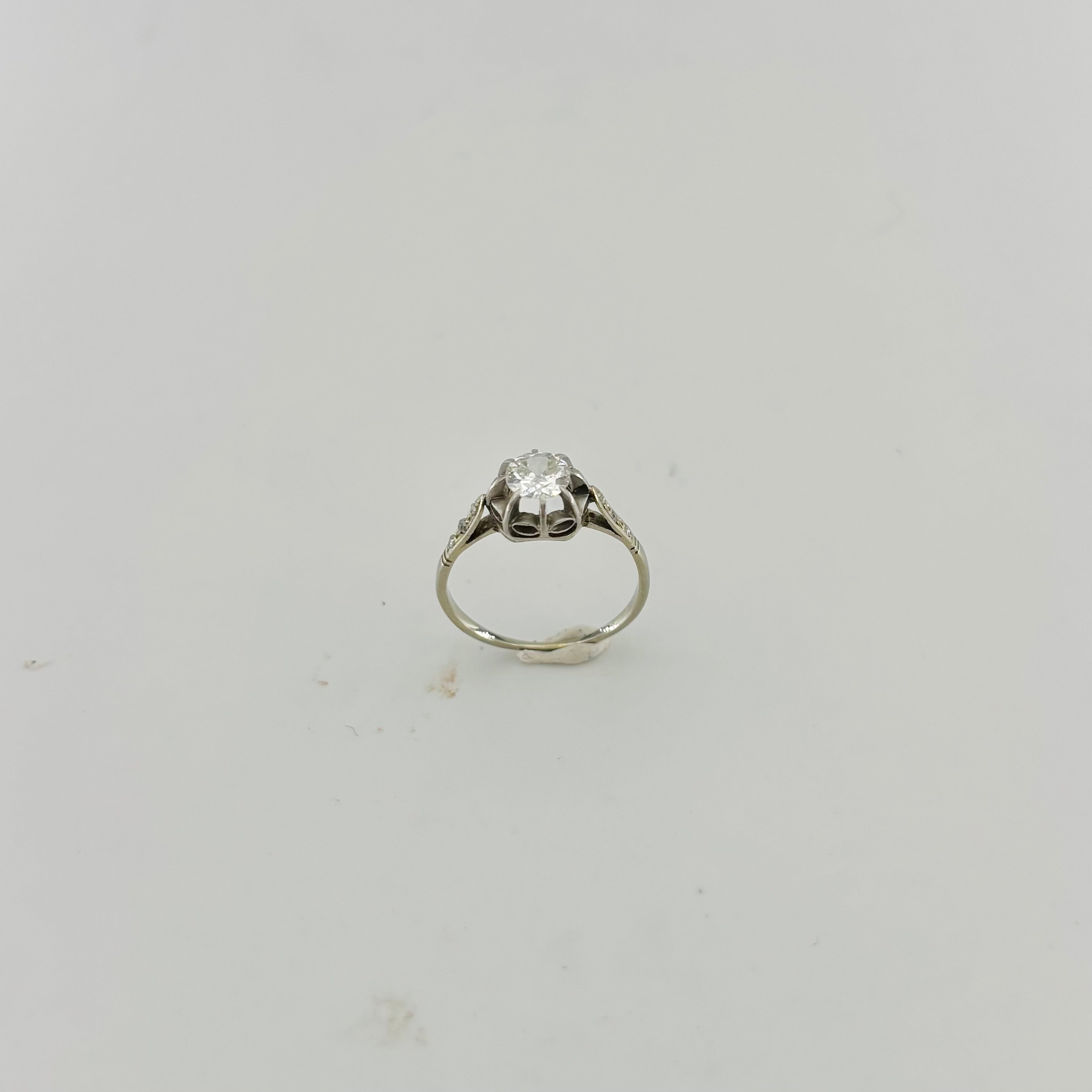 Solitaire Ring in White Gold, Platinum, and Diamonds