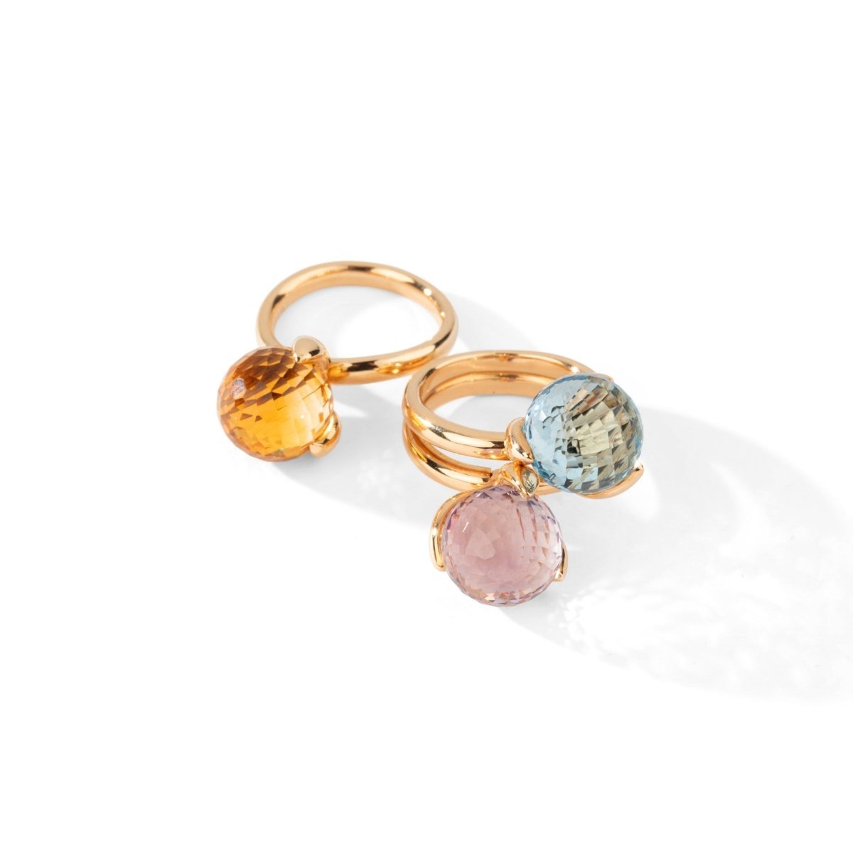 Deux bagues en or jaune, améthyste, topaze bleue et citrine - Castafiore