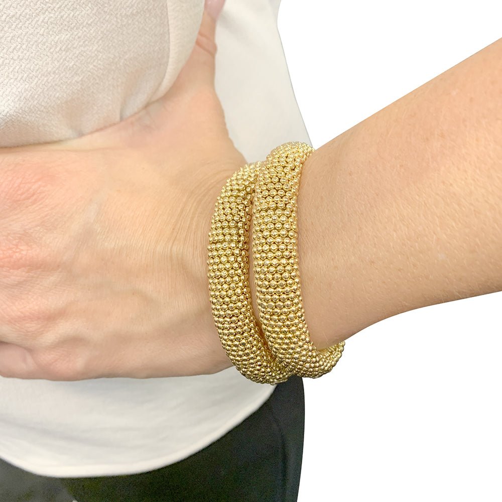 Deux bracelets vintages transformables, or jaune. - Castafiore