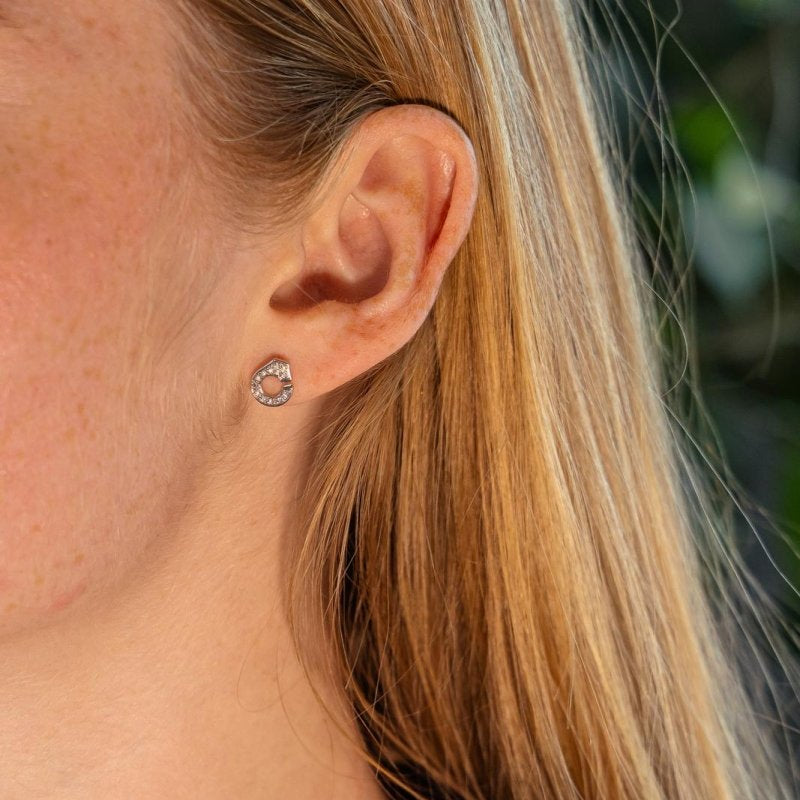 Dinh Van Boucles d'oreilles Menottes Or blanc Diamant - Castafiore