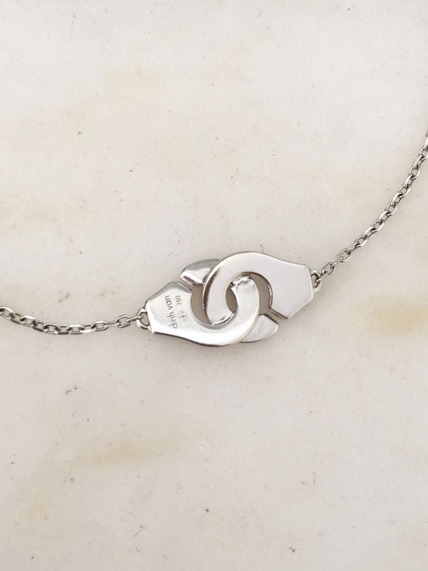DINH VAN Bracelet menottes en or blanc 18K - Castafiore