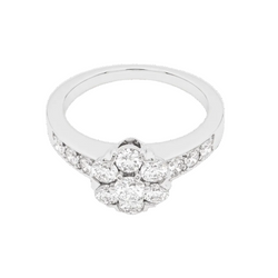 Bague Van Cleef & Arpels, "Fleurette", or blanc et diamants.
