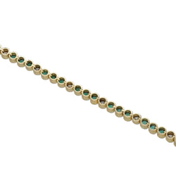 "Ligne" Bracelet in Yellow Gold, Emeralds, and Diamonds