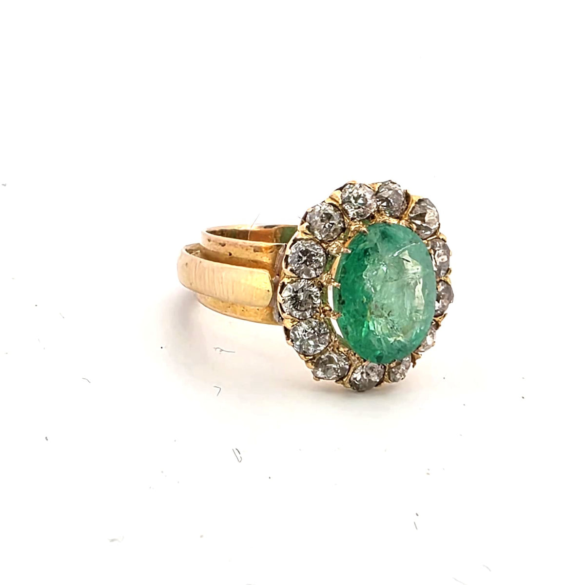 "Entourage" Ring in Yellow Gold, Emerald, and Diamonds