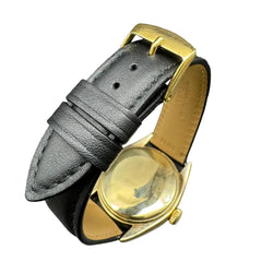 ROLEX "Oyster Perpetual 34" watch in yellow gold and leather