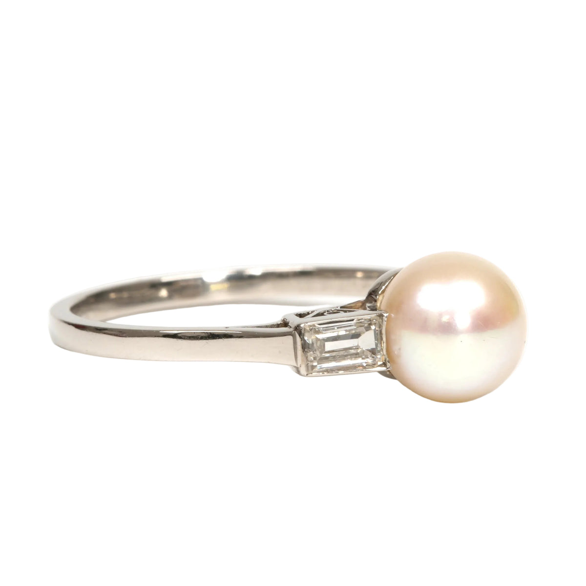 White Gold Solitaire Ring with a Pearl and Diamonds