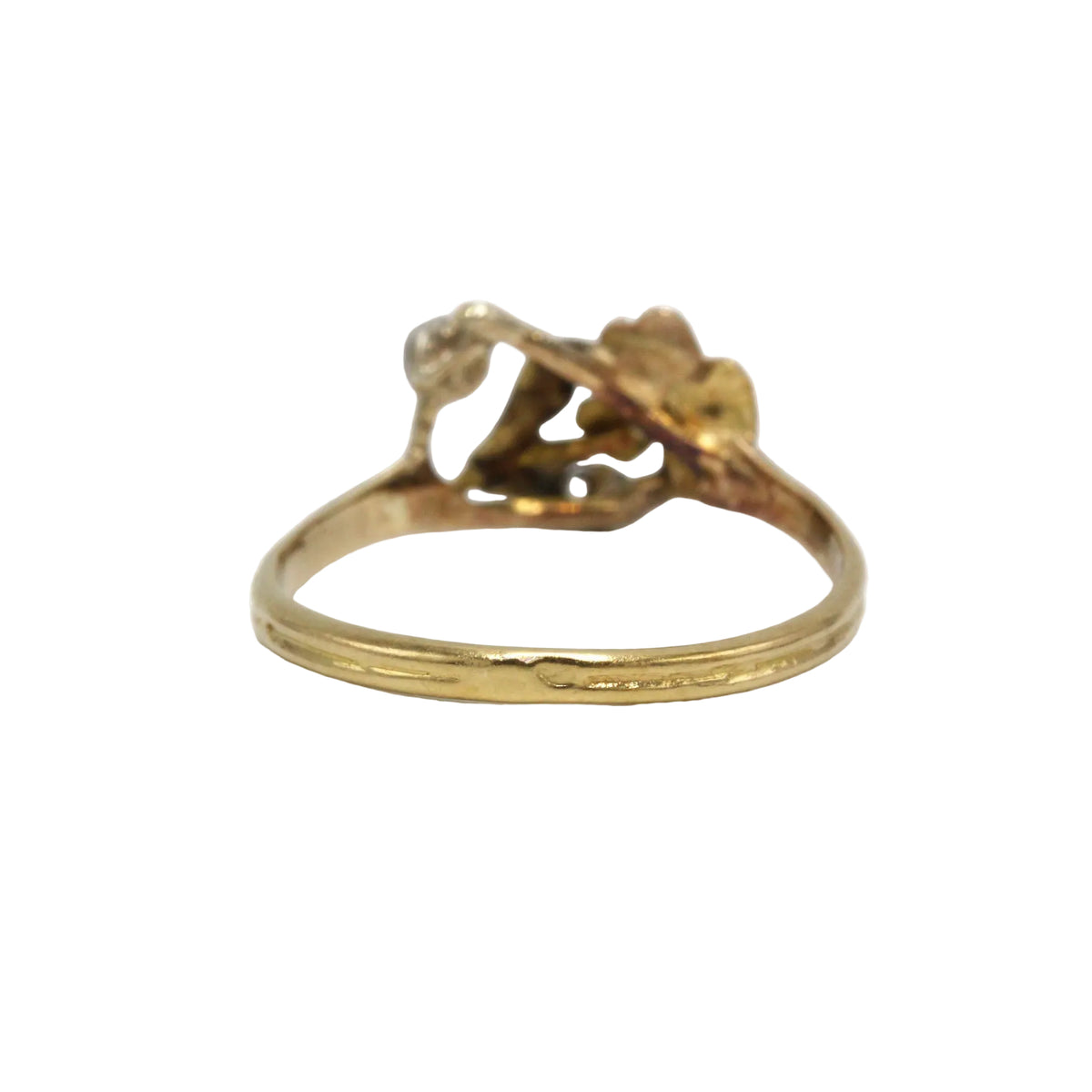 Ring made of yellow gold, silver, black stone, and Diamonds