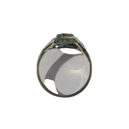 Art Deco ring in white gold, emerald, and diamonds