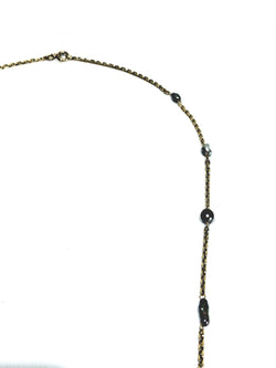 Rose gold long necklace with Tahitian pearls.