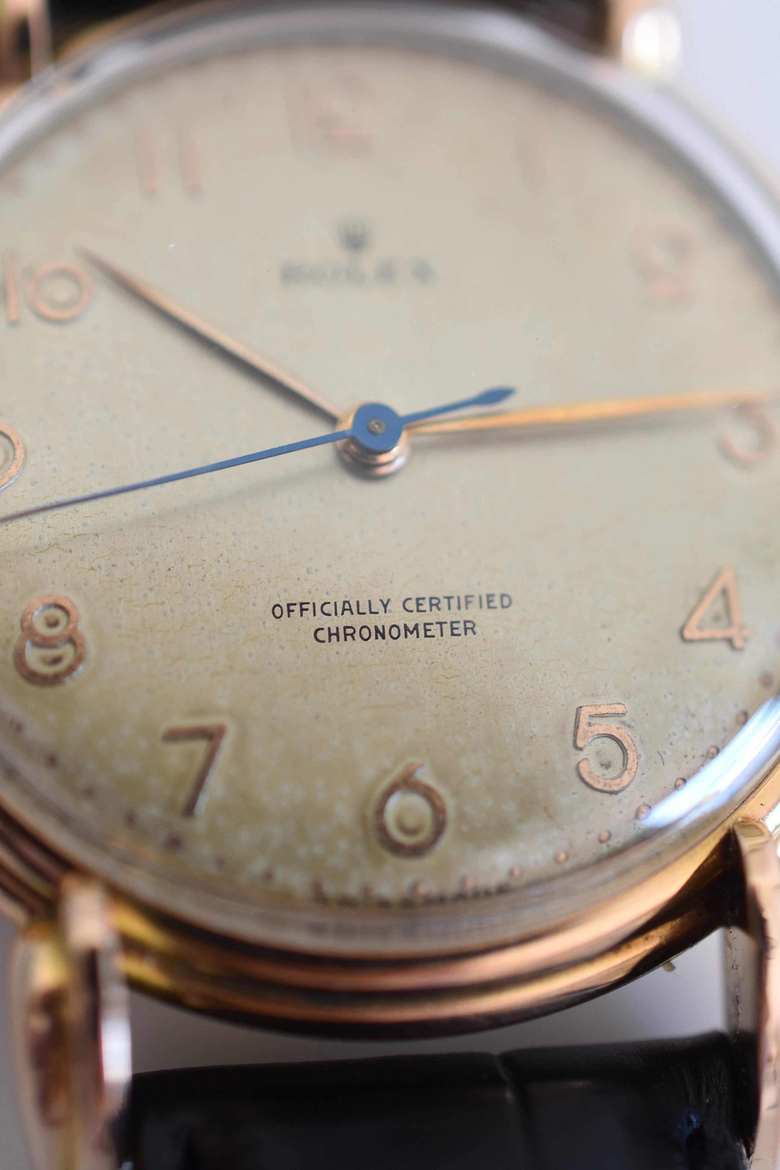 ROLEX "Chronometer" watch in rose gold, steel, and leather