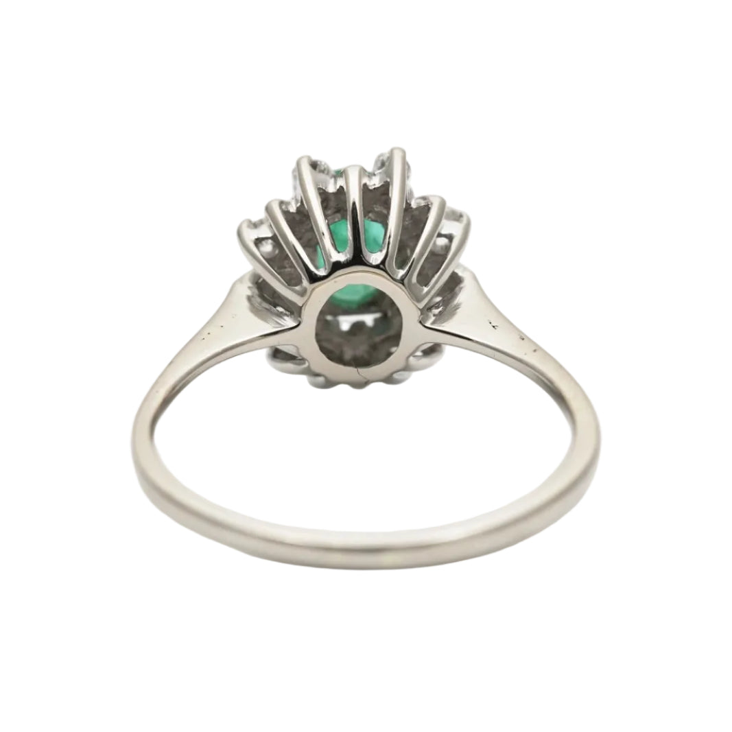 "Entourage" Ring in White Gold, Emerald, and Diamonds