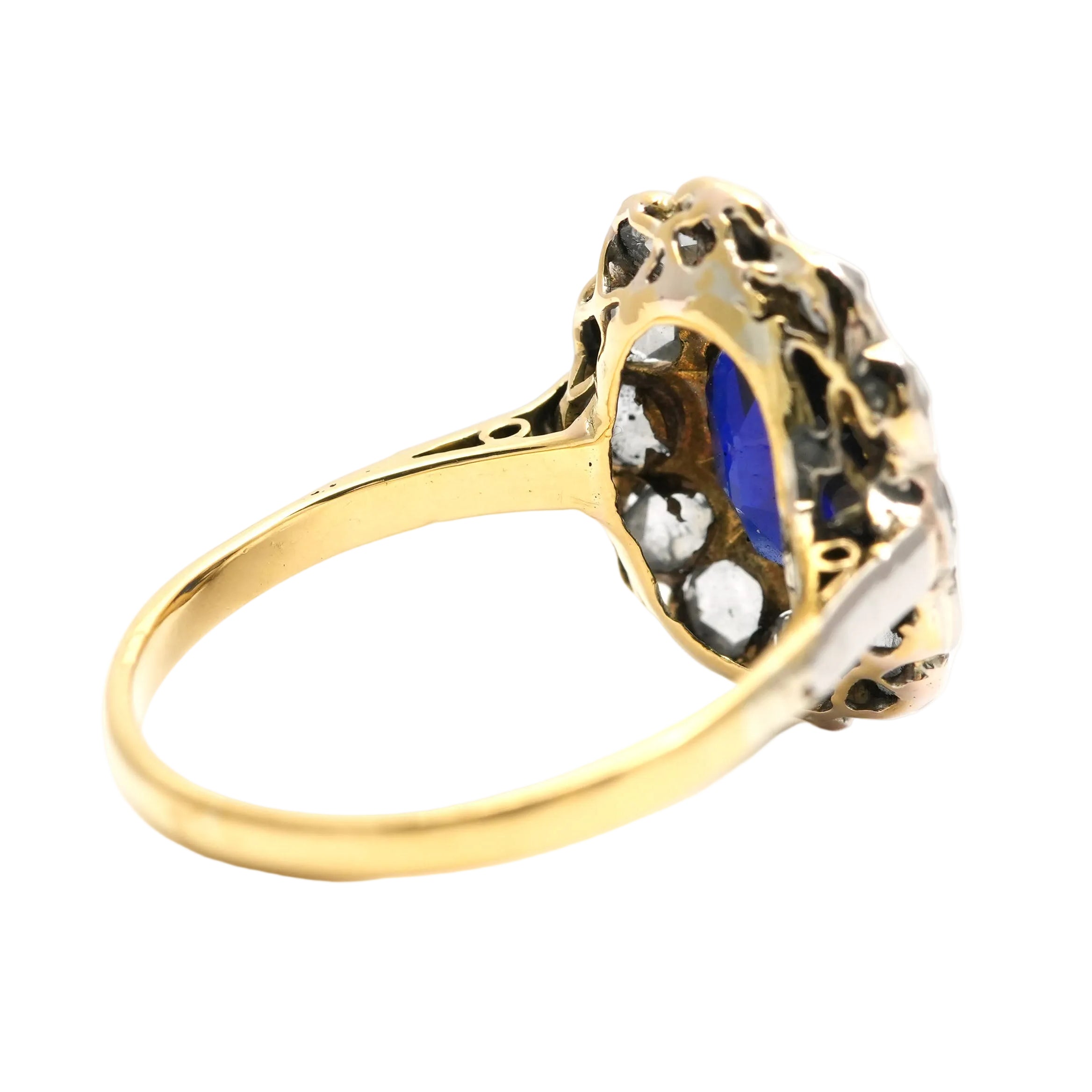 Entourage Ring in white gold, yellow gold, sapphire, and diamonds