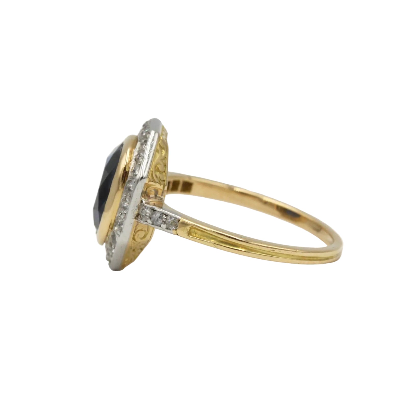 Entourage Ring in yellow gold, Platinum, Sapphire, and Diamonds
