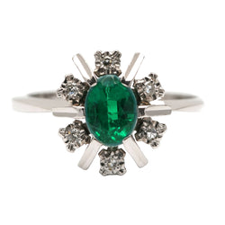 "Entourage" Ring in White Gold, Emerald, and Diamonds