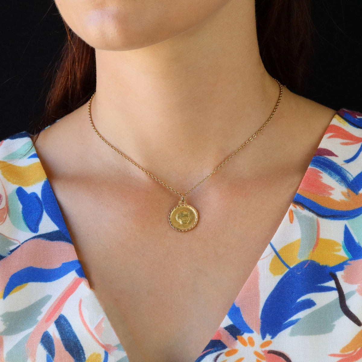 Medal in yellow gold and rose gold