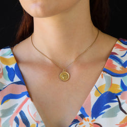 Medal in yellow gold and rose gold