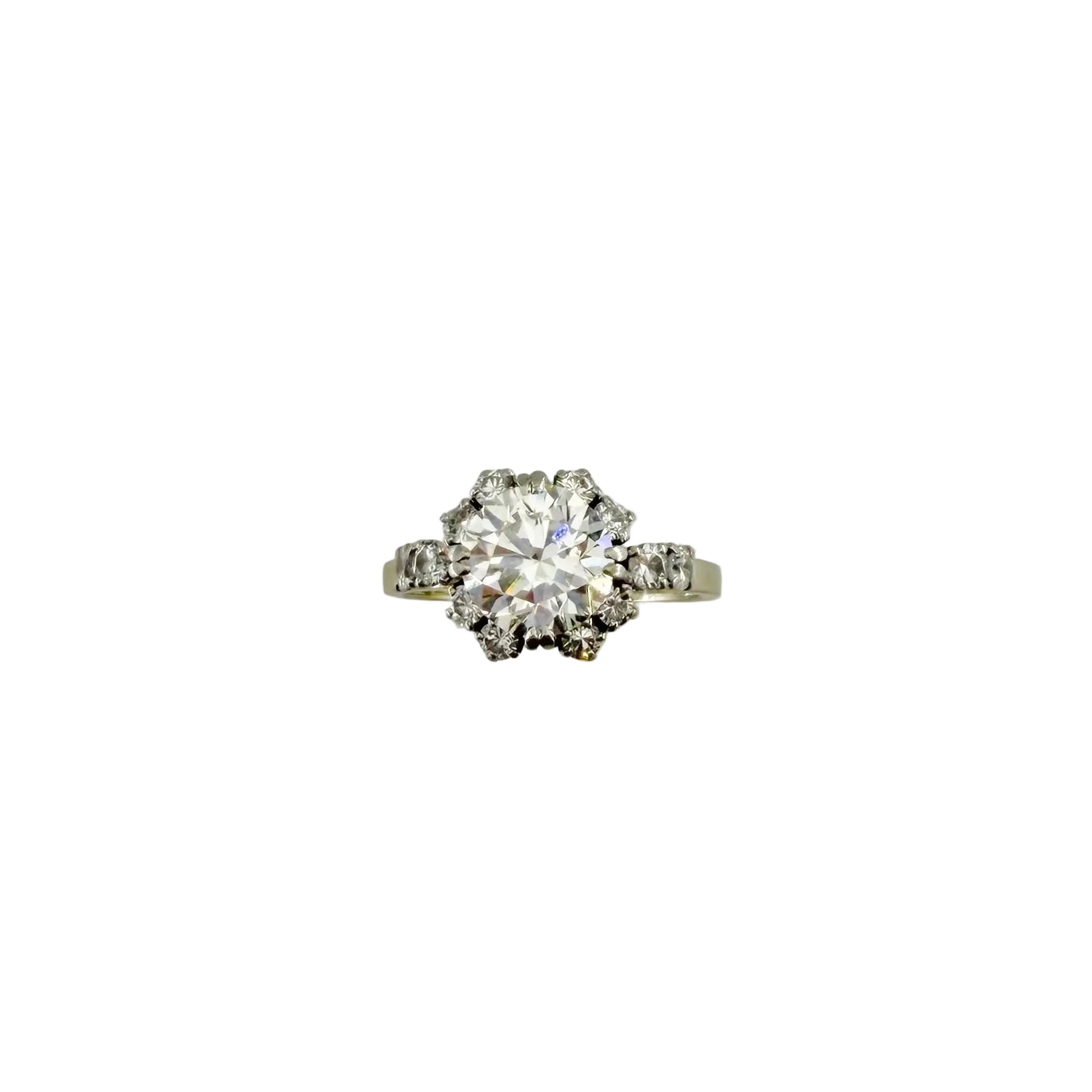 Solitaire Ring in Platinum, White Gold, and Diamonds