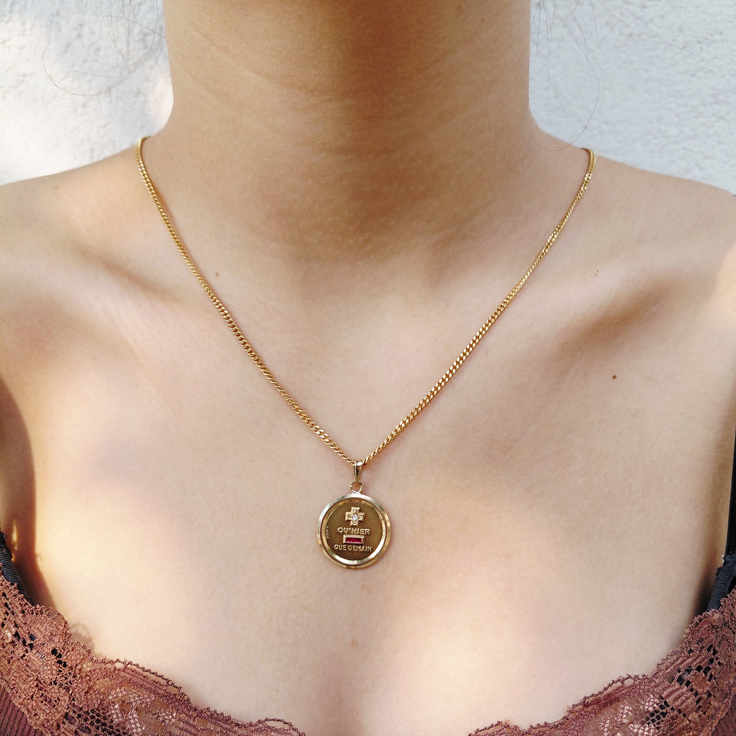 AUGIS Medal in yellow gold, rubies, and diamonds