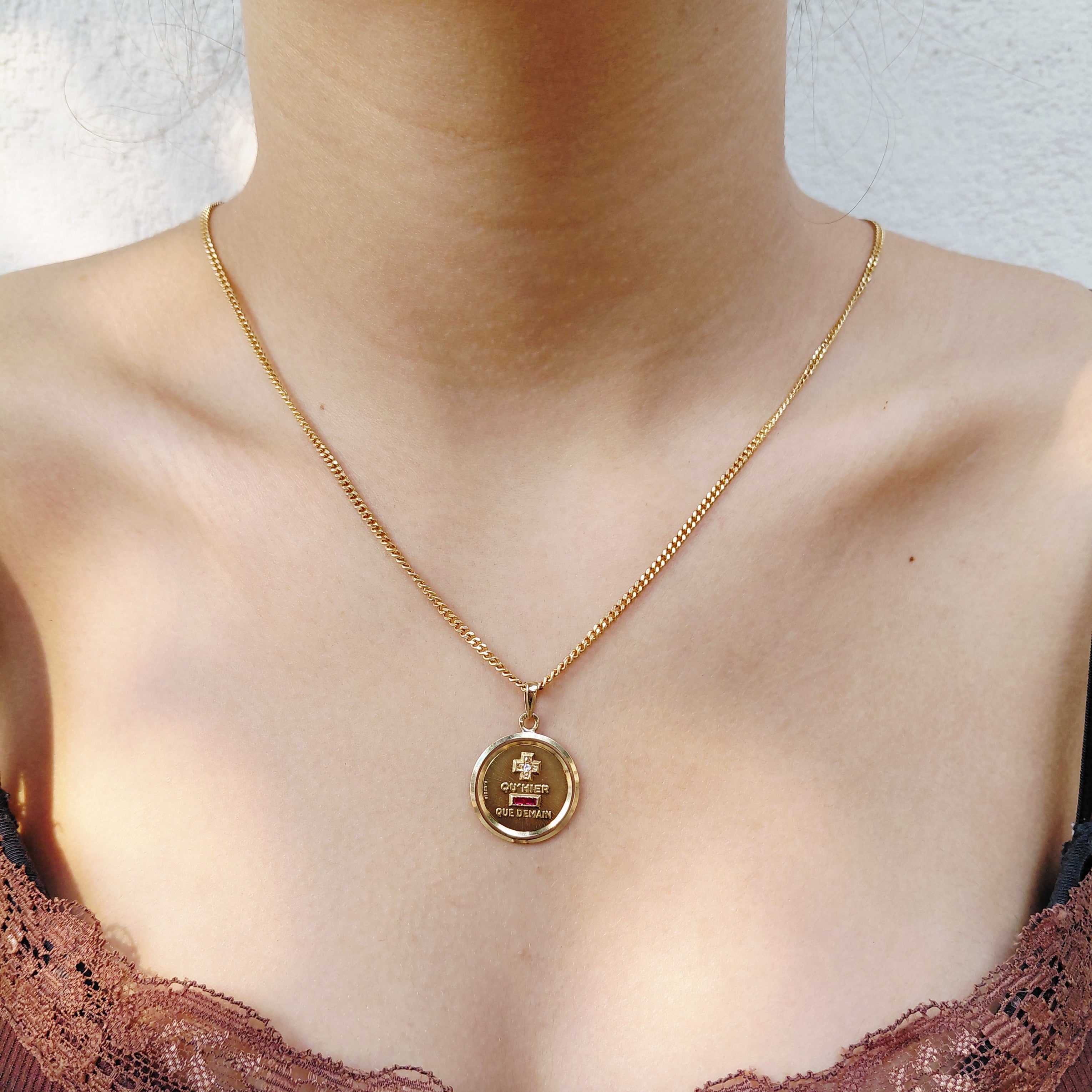 AUGIS Medal in yellow gold, rubies, and diamonds