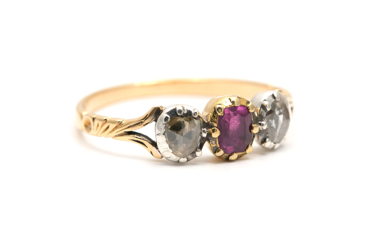Trilogy Ring in yellow gold, rubies, and diamonds