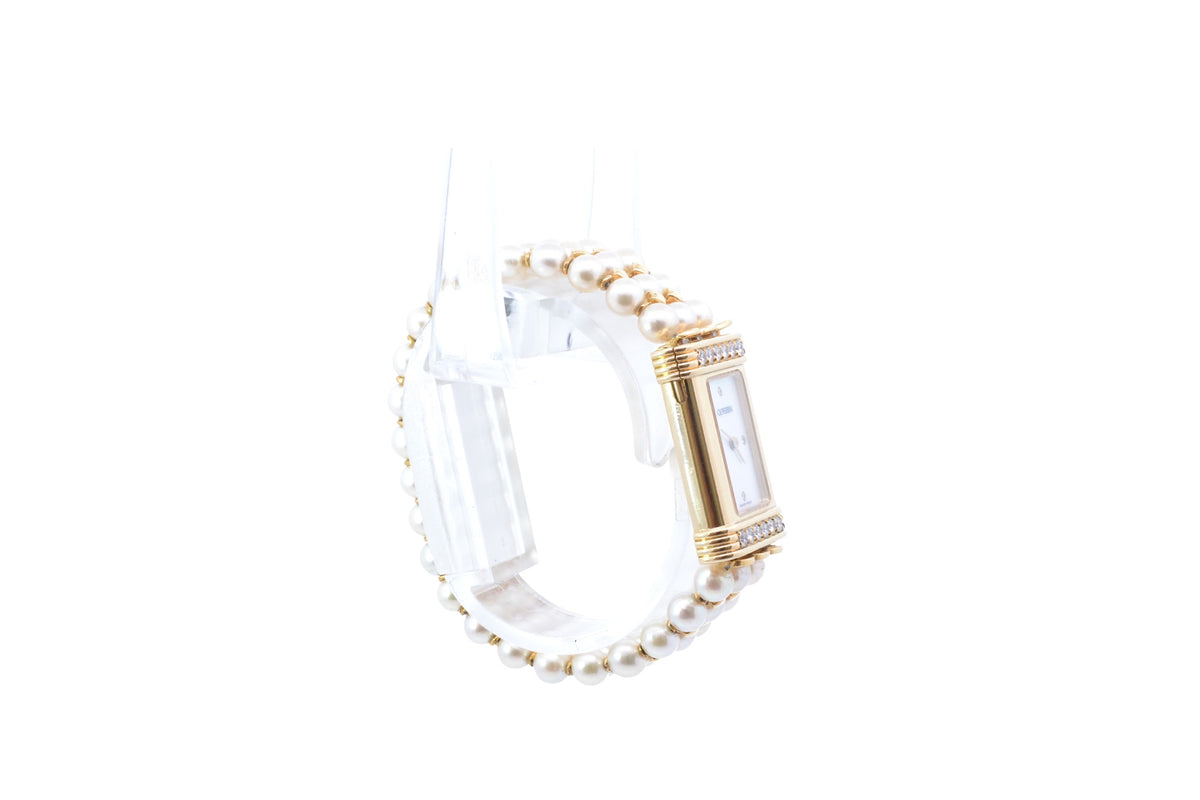 OJ Perrin watch in yellow gold, pearls, and diamonds