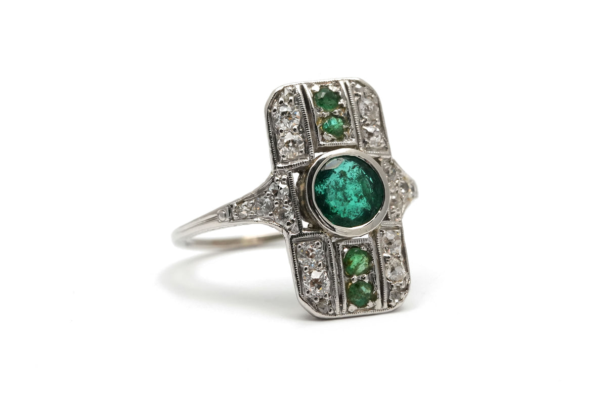 Art Deco ring in white gold, emeralds, and diamonds