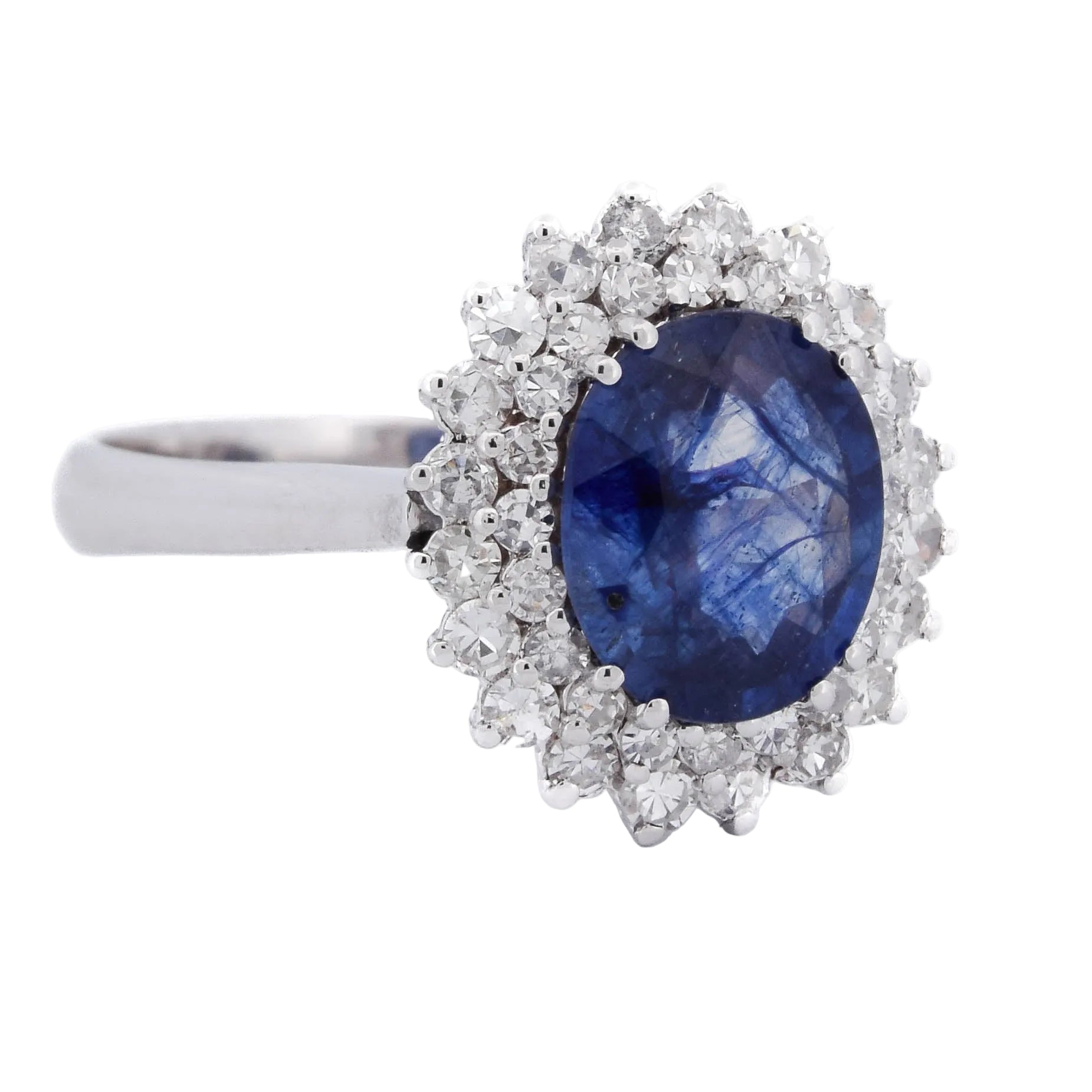 "Entourage" Ring in White Gold, Sapphire, and Diamonds