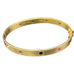CARTIER "Love Passion" Bangle Bracelet in yellow gold, rubies, and sapphires