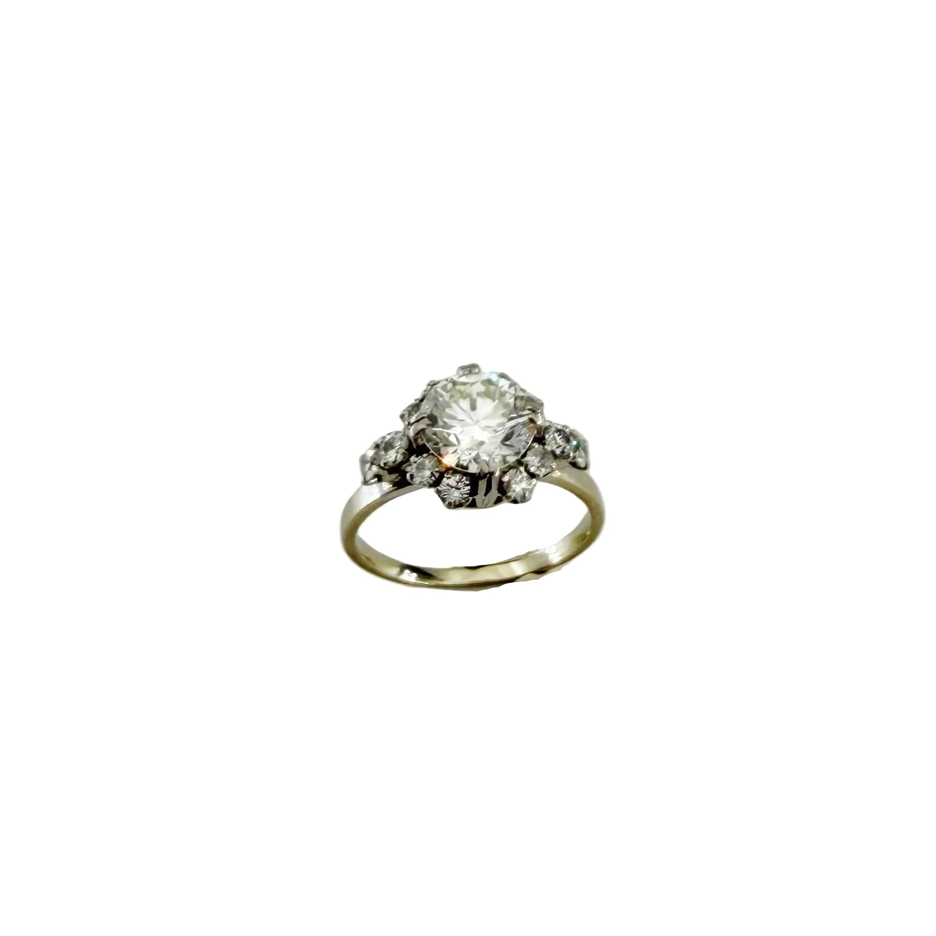 Solitaire Ring in Platinum, White Gold, and Diamonds