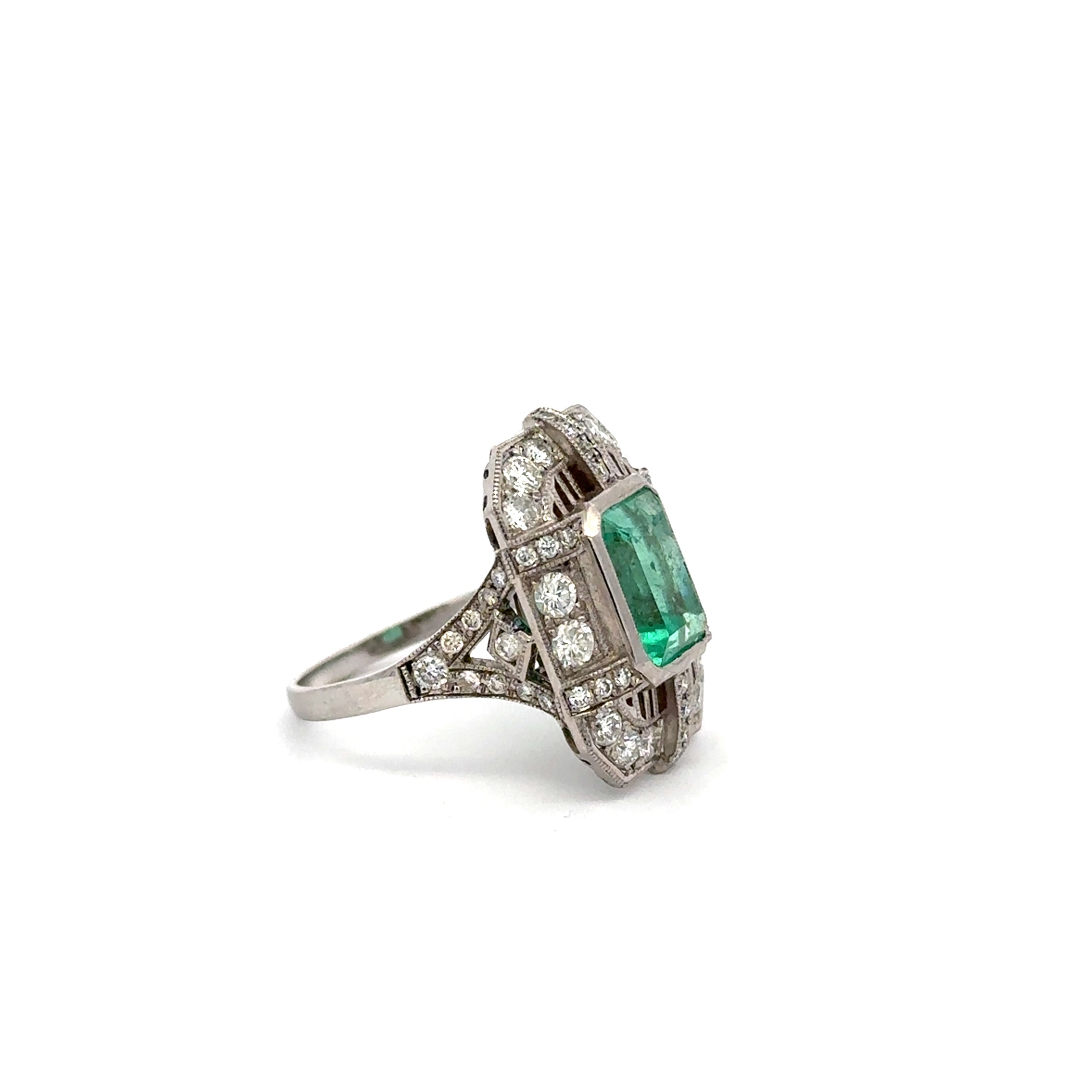 "Entourage" Ring in White Gold, Emerald, and Diamonds