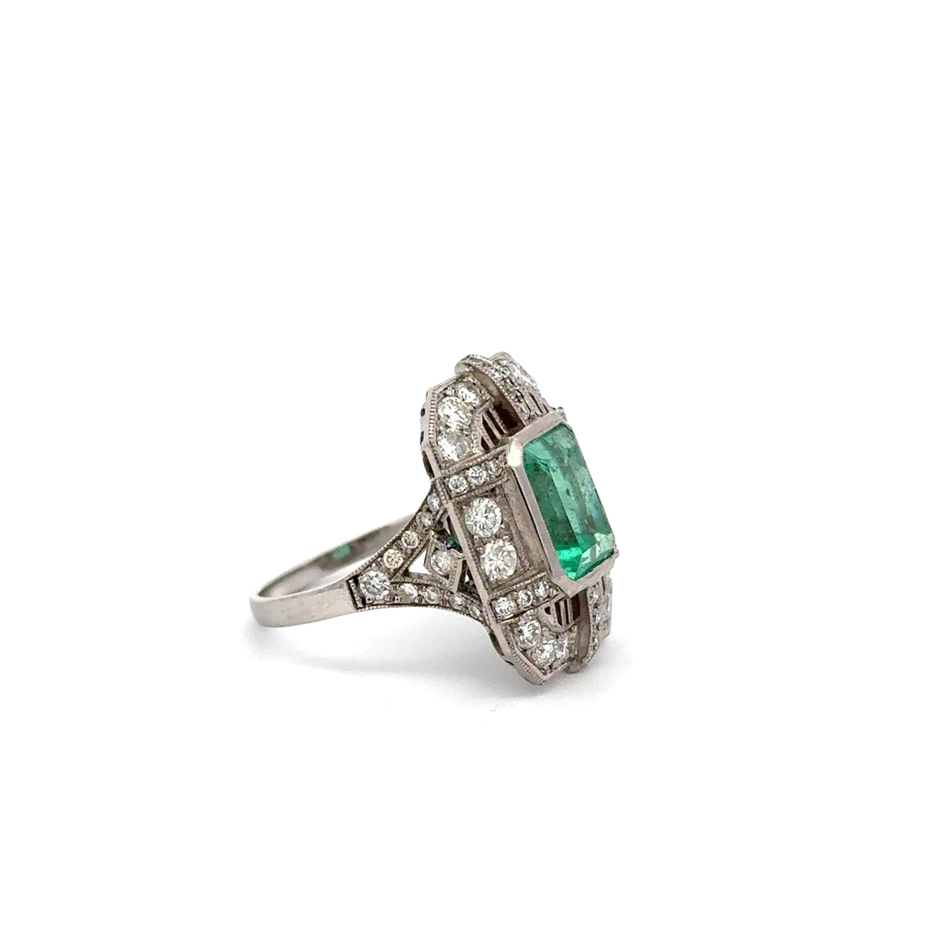 "Entourage" Ring in White Gold, Emerald, and Diamonds