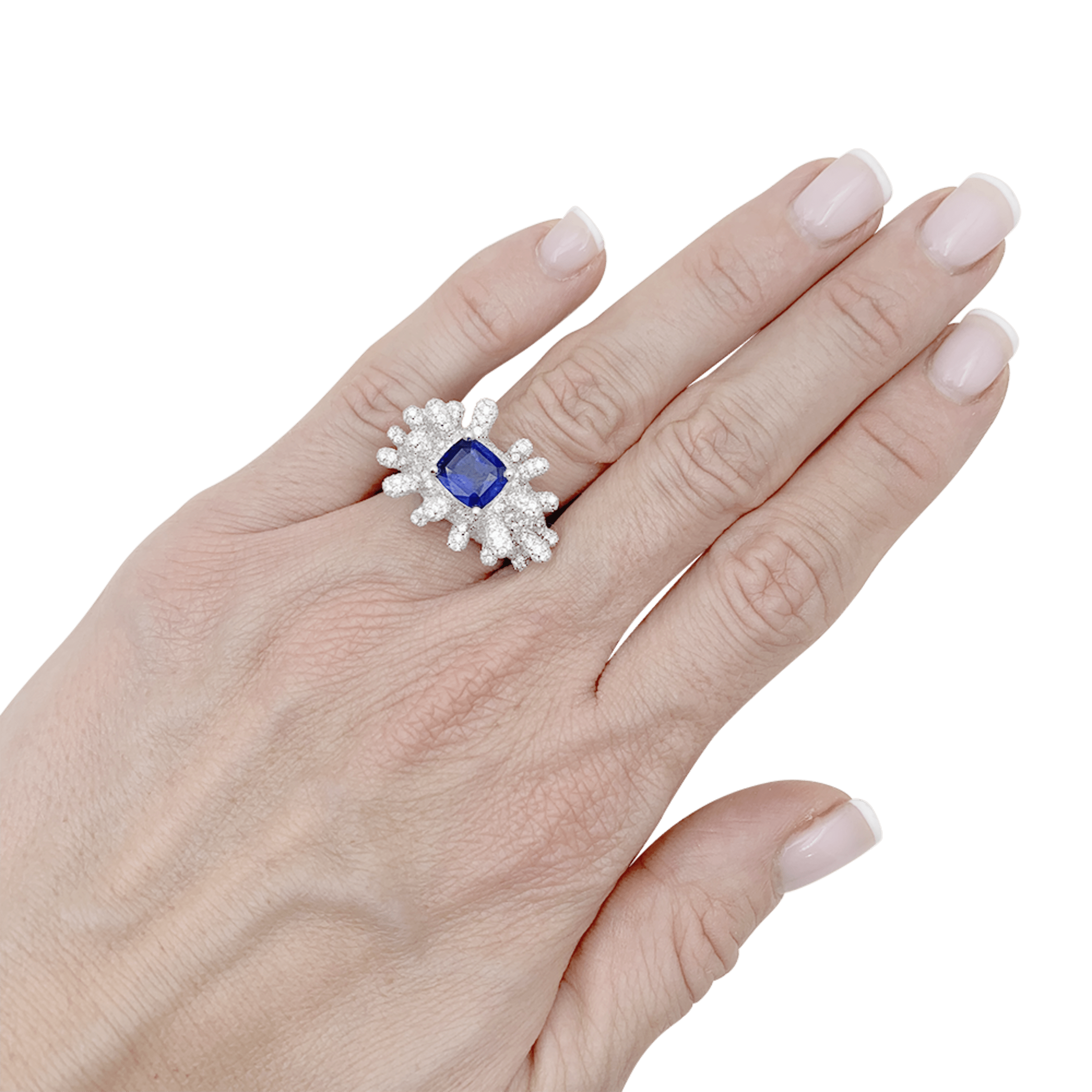 Bague Manalys en or blanc, diamants et saphir.