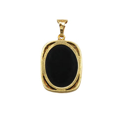 Yellow gold, Onyx, and Diamond pendant