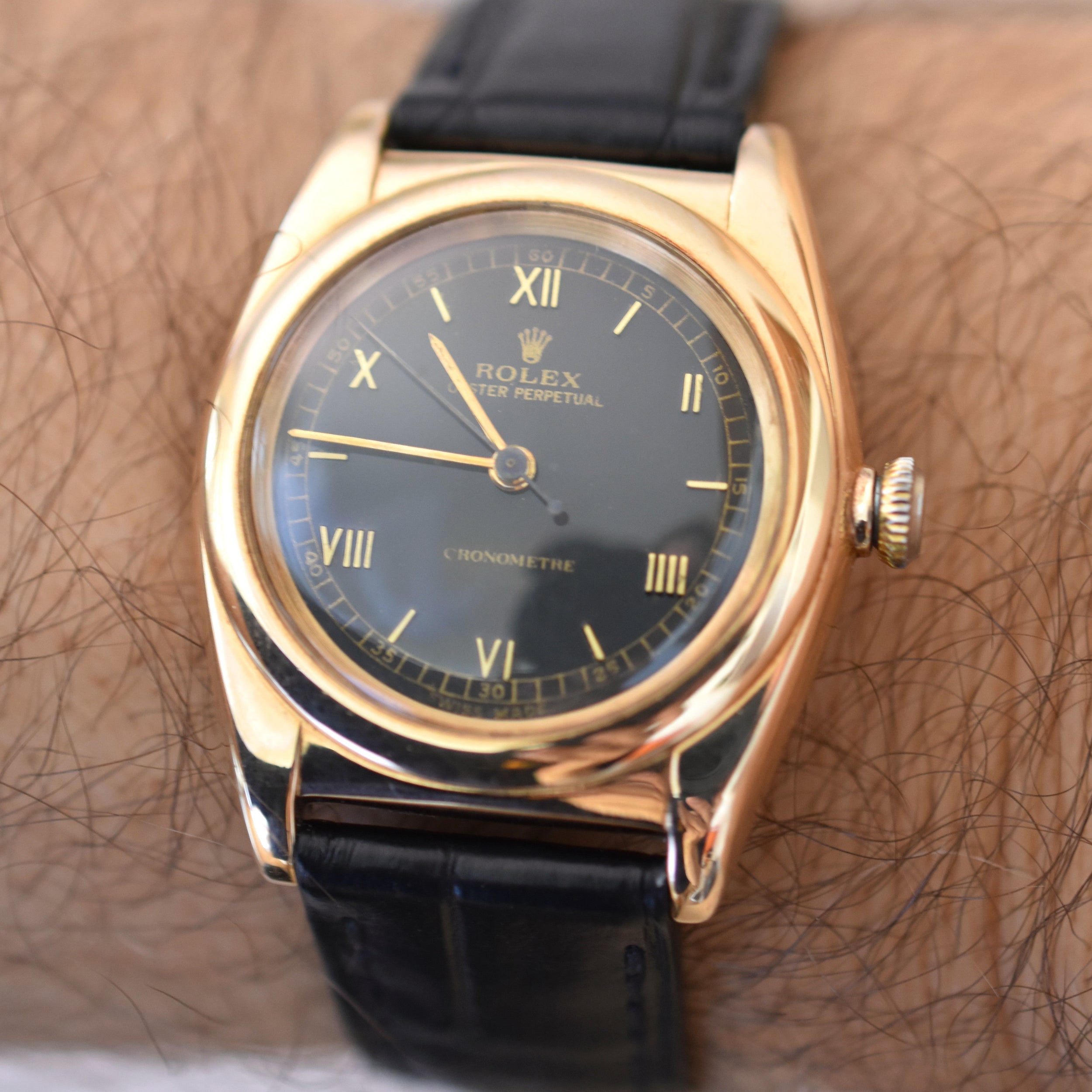 ROLEX "Oyster Perpetual Bubbleback Ovetto" watch in yellow gold and leather