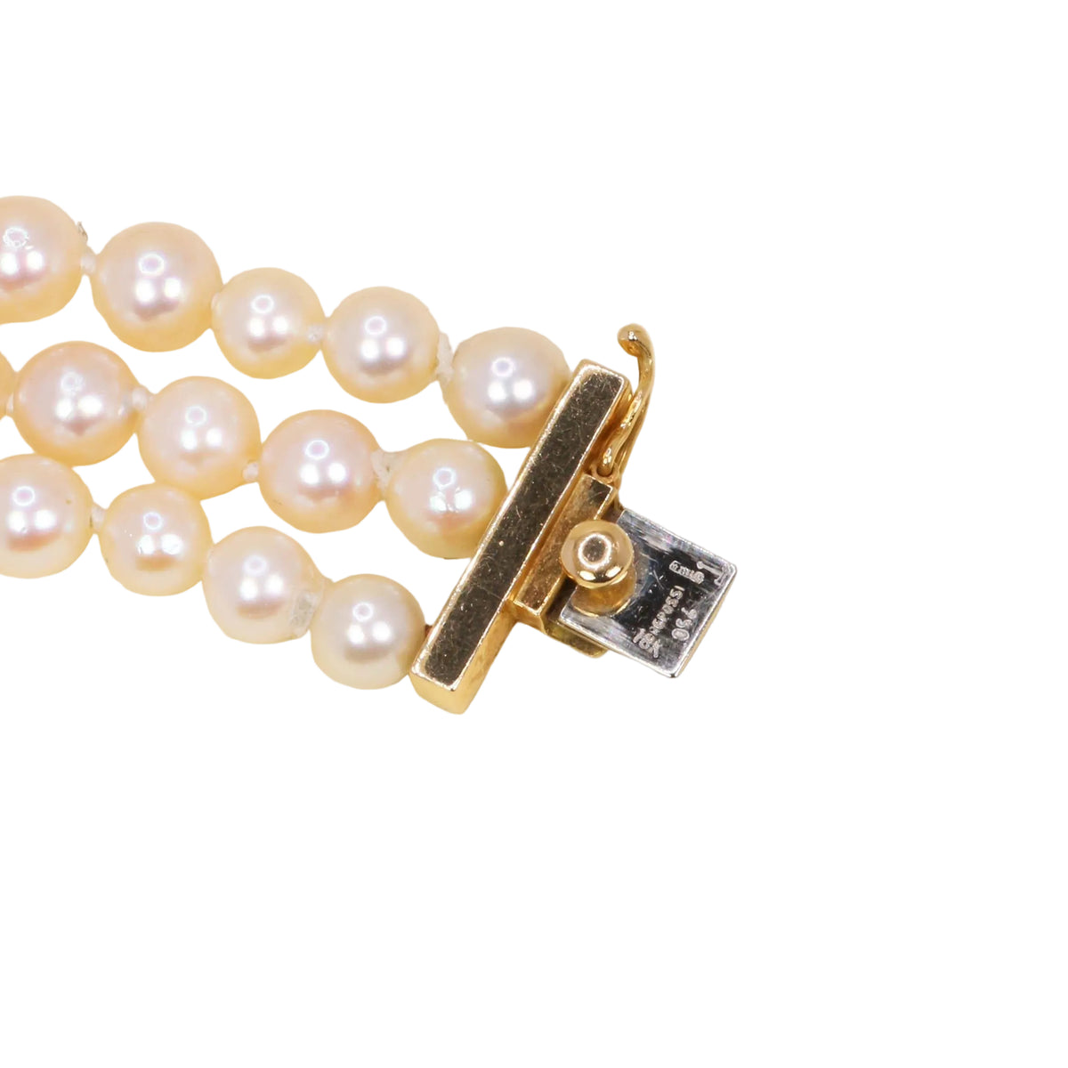 REPOSSI set in yellow gold, with pearls, sapphires, emeralds, and diamonds