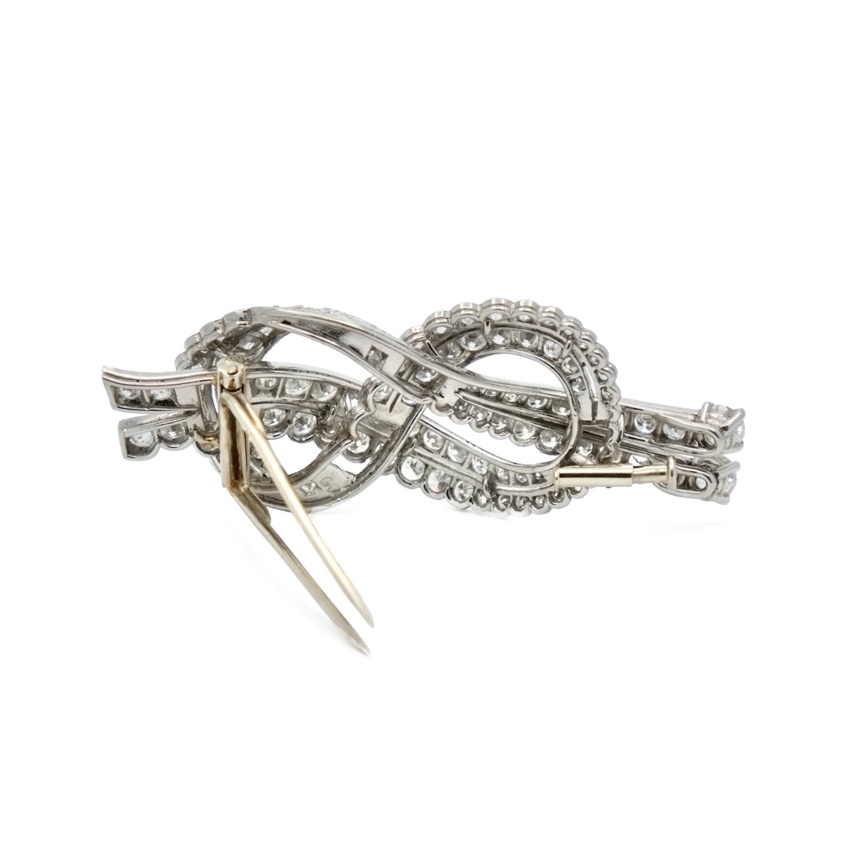 Épingle noeud en or gris et platine avec diamants - Castafiore