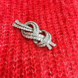 Épingle noeud en or gris et platine avec diamants - Castafiore