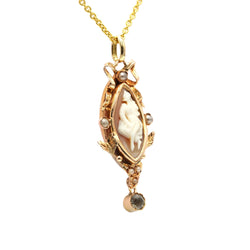 Yellow gold pendant with a pearl cameo and rhinestones