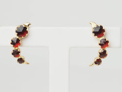 Boucles d’oreilles en or jaune et grenats