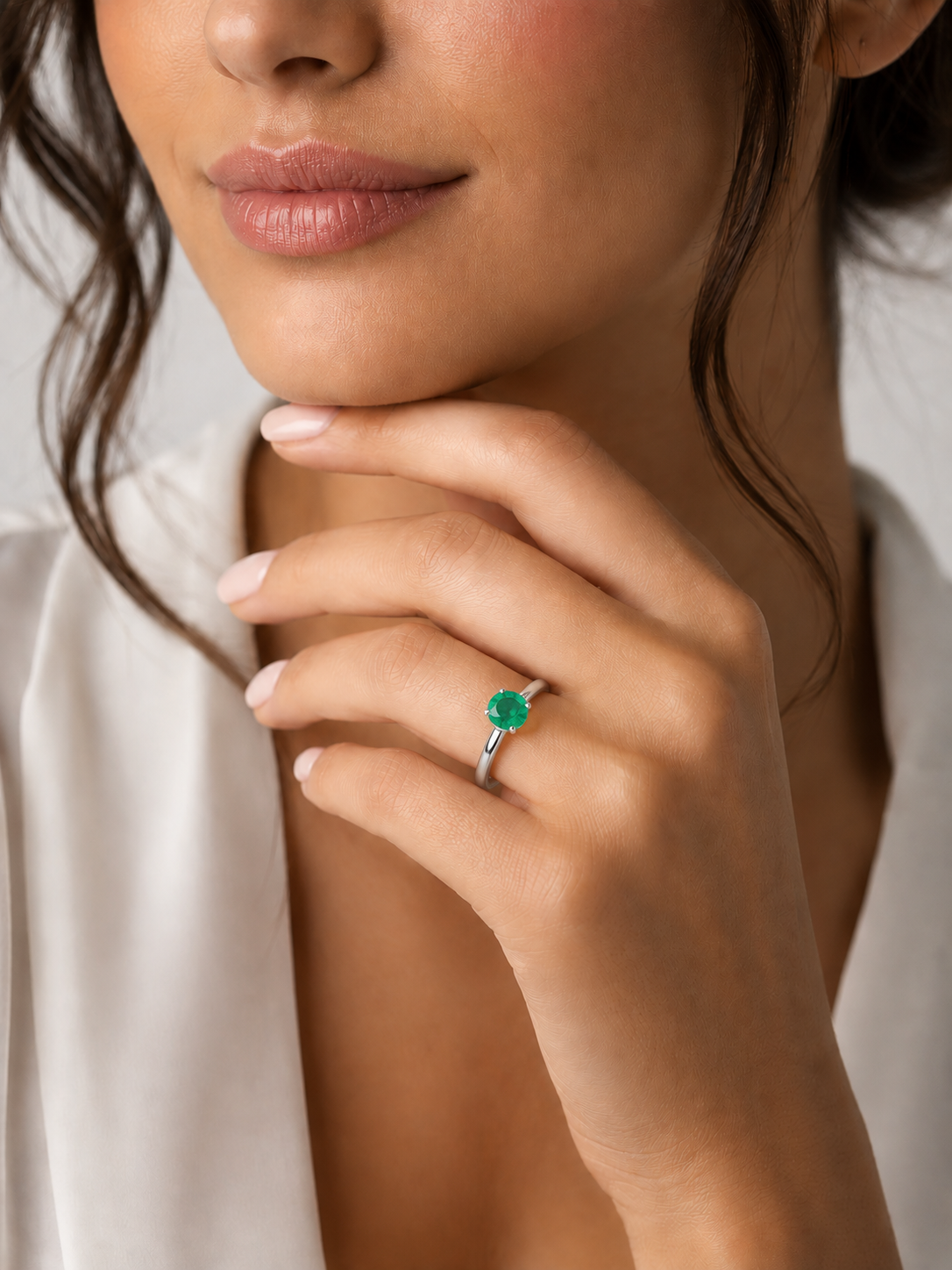 White Gold and Emerald Solitaire Ring