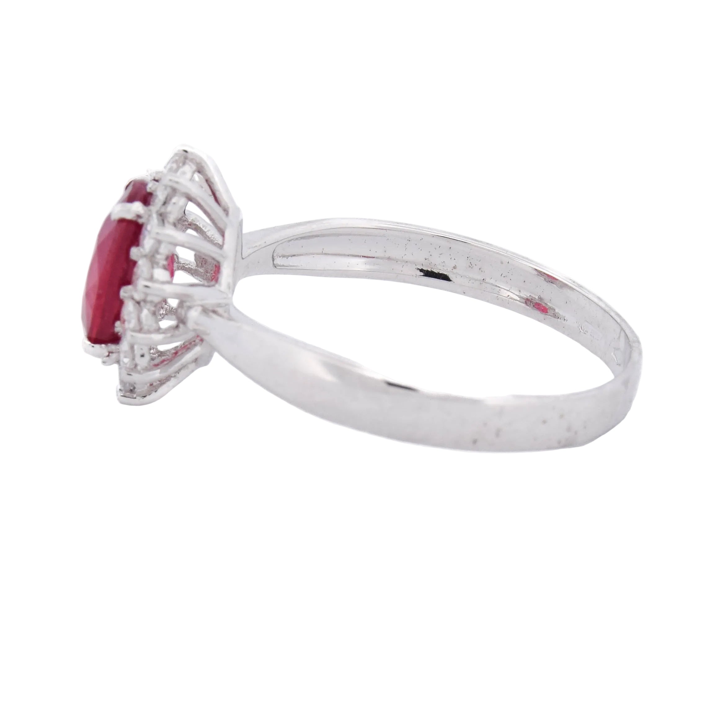 Entourage Ring in white gold, rubies, and diamonds
